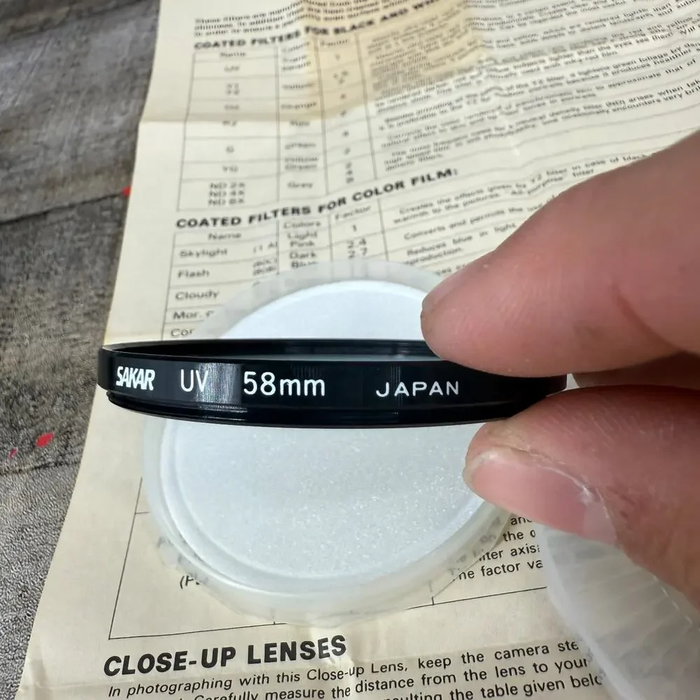 Sakar 52mm Camera Lens Filter Coated UV 58MM W/ Paper Guide